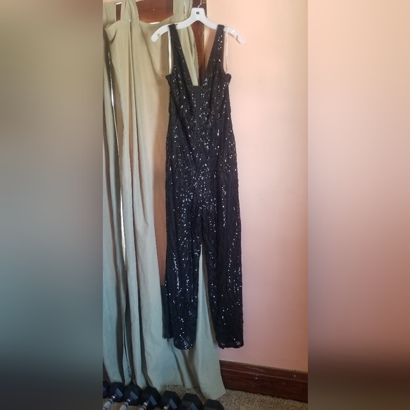 Black sequined womens jumpsuit. Worn once, absolutely...